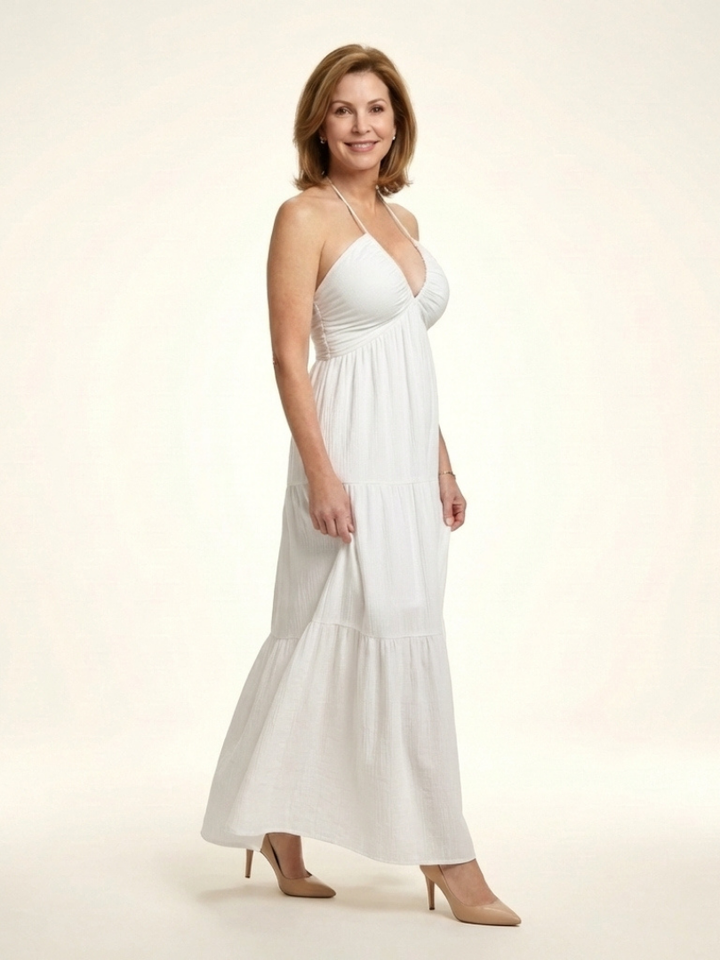 Solenne | Vestido largo de escote halter con cuerpo fruncido y volantes