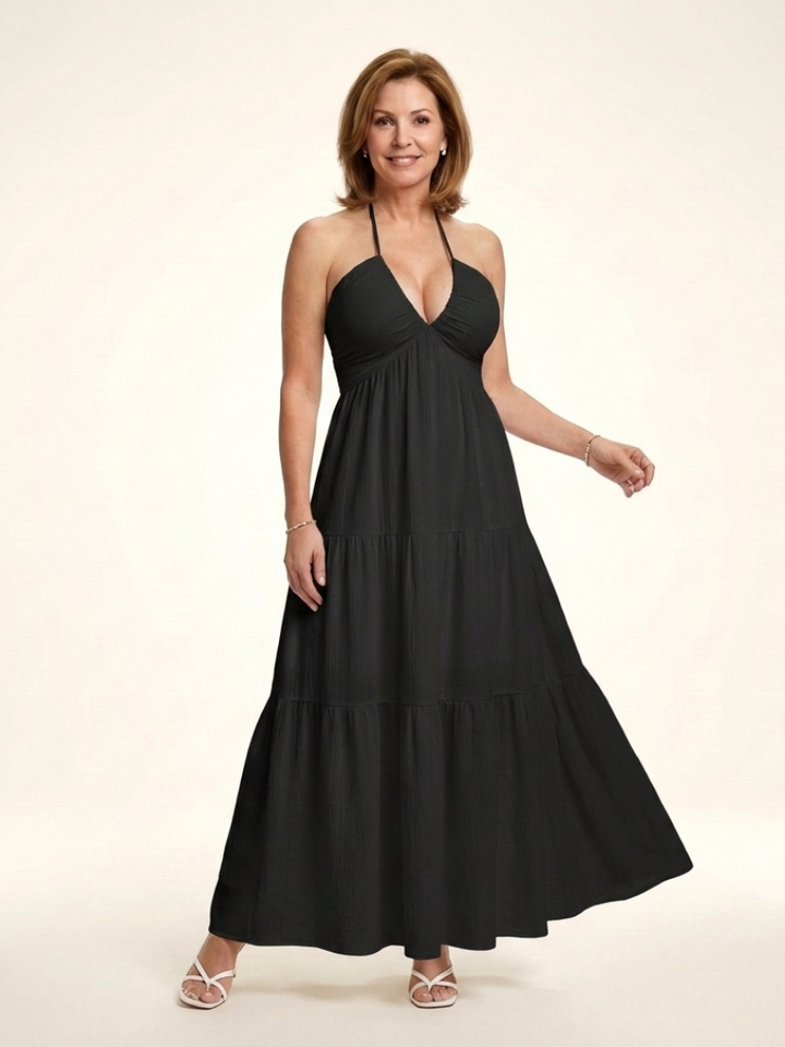 Solenne | Vestido largo de escote halter con cuerpo fruncido y volantes