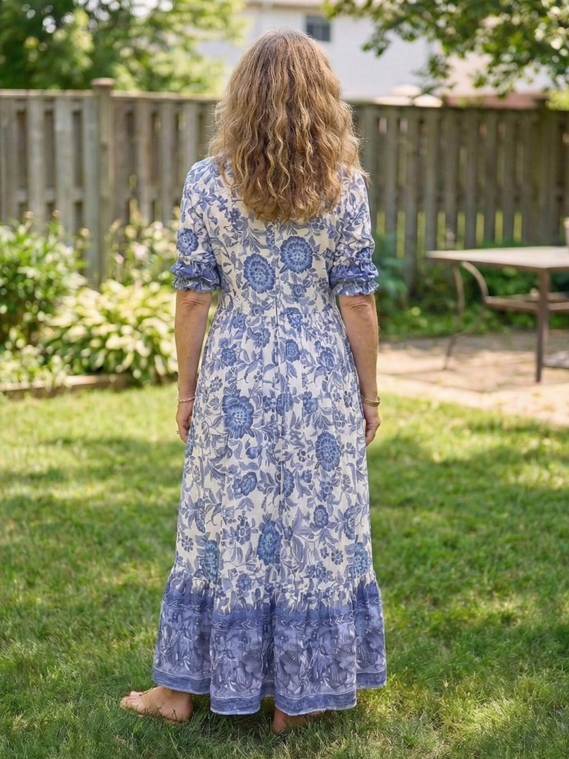 Calandra | Vestido midi floral de manga corta y escote en V